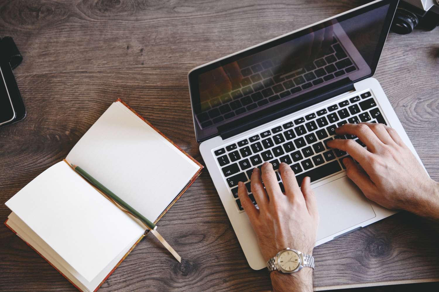 A person typing on a computer.